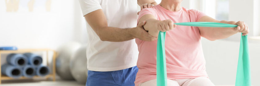 Elderly woman doing exercises